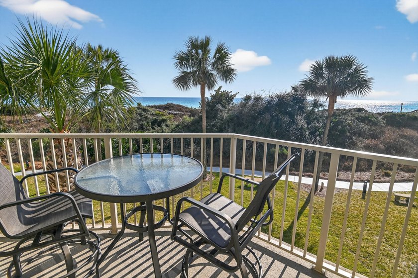 Experience coastal living at its finest with this gulf-front - photo 5
