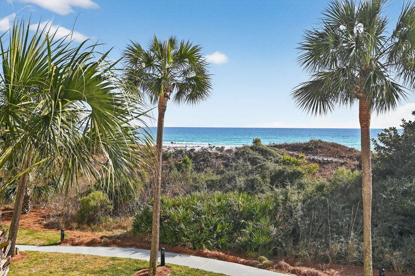 Experience coastal living at its finest with this gulf-front - photo 6