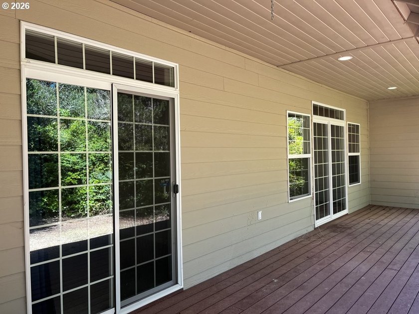 Nestled in a peaceful wooded setting within the desirable Heceta - photo 36
