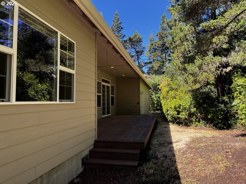 Nestled in a peaceful wooded setting within the desirable Heceta - photo 37