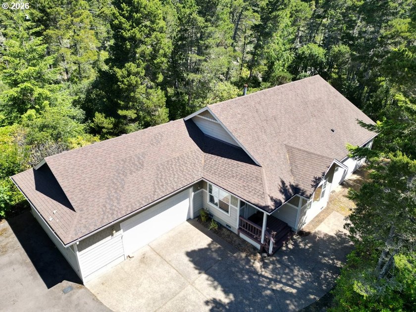 Nestled in a peaceful wooded setting within the desirable Heceta - photo 42