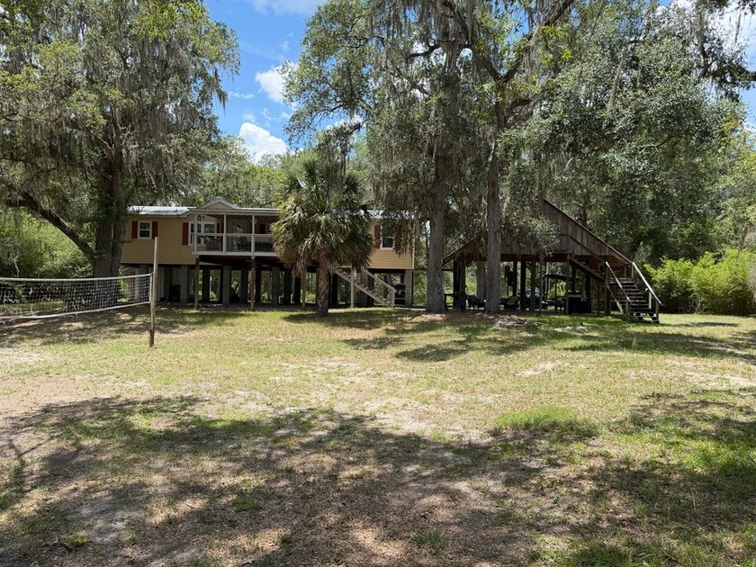 Wake up to breathtaking views of the Suwannee River from this - photo 36