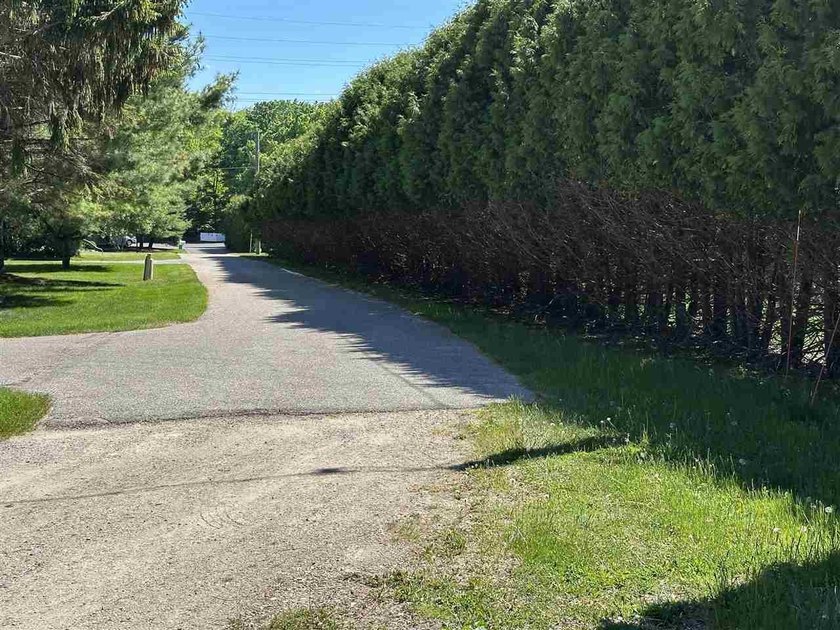 VIEWS! Stunning Lake Charlevoix views on a 1+ acre property - photo 36