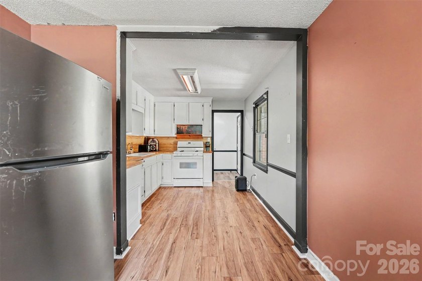 Welcome to this beautifully updated 3-bed, 2-bath home in the - photo 8
