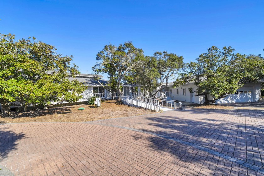 PRICE REDUCED !!Upon entering the gates of Four Mile Village you - photo 3