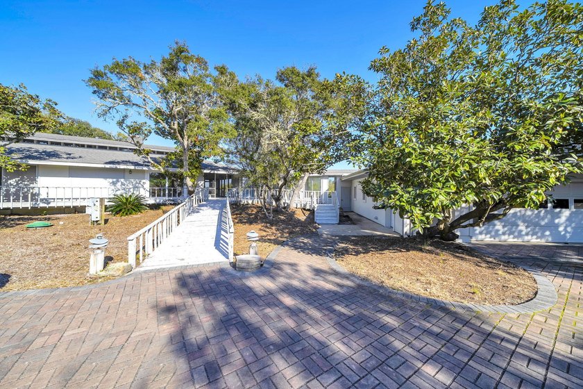 PRICE REDUCED !!Upon entering the gates of Four Mile Village you - photo 4