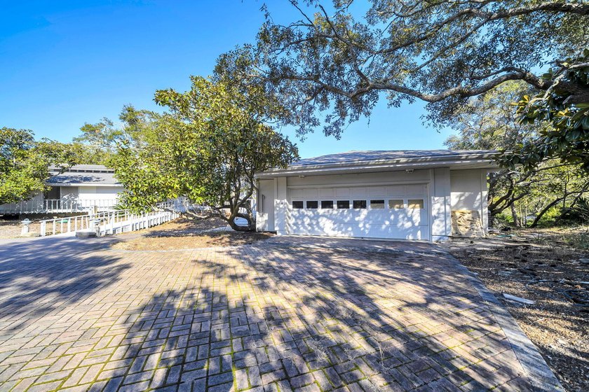 PRICE REDUCED !!Upon entering the gates of Four Mile Village you - photo 5