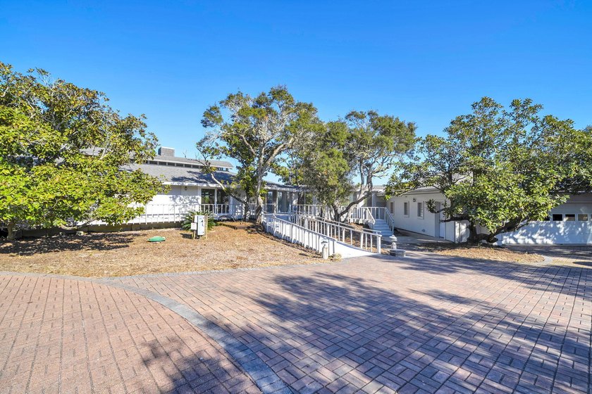 PRICE REDUCED !!Upon entering the gates of Four Mile Village you - photo 6