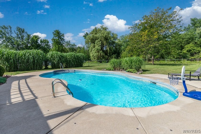 Welcome home to 212 East Ave! This inviting two-story home sits - photo 5