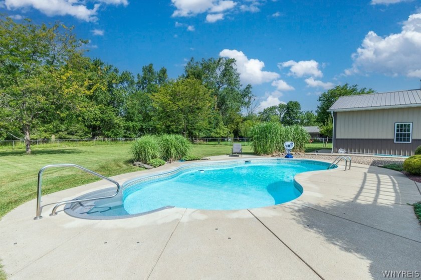 Welcome home to 212 East Ave! This inviting two-story home sits - photo 8