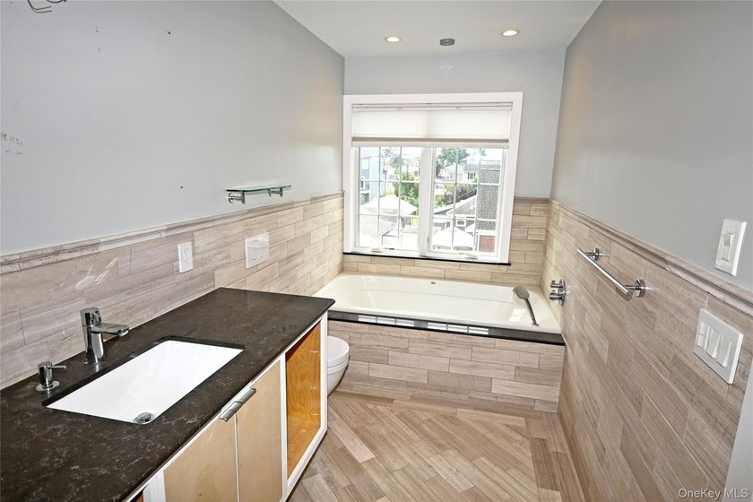 Spacious Waterfront Almost New Construction | 5 Bed | 3 Bath | - photo 29