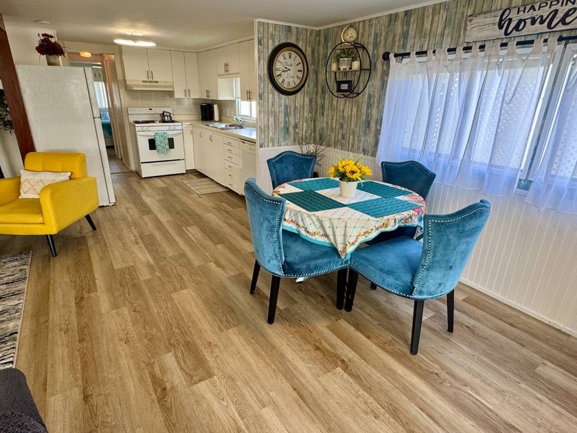 PRICE JUST REDUCED! Charming Updated Mobile Home with Expansion - photo 7