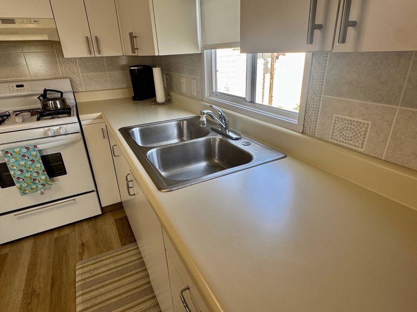 PRICE JUST REDUCED! Charming Updated Mobile Home with Expansion - photo 10