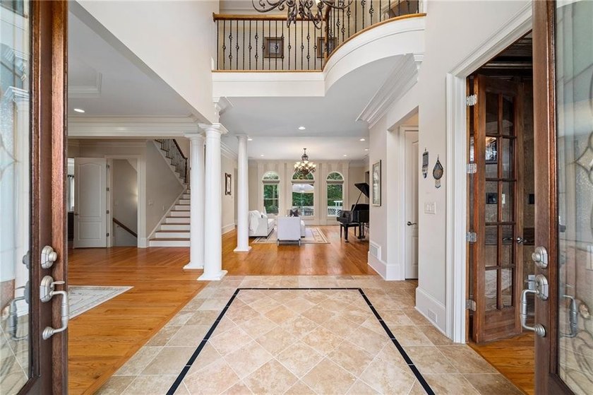 Situated on 1.2+/- private acres within Milton's gated Roxbury - photo 5