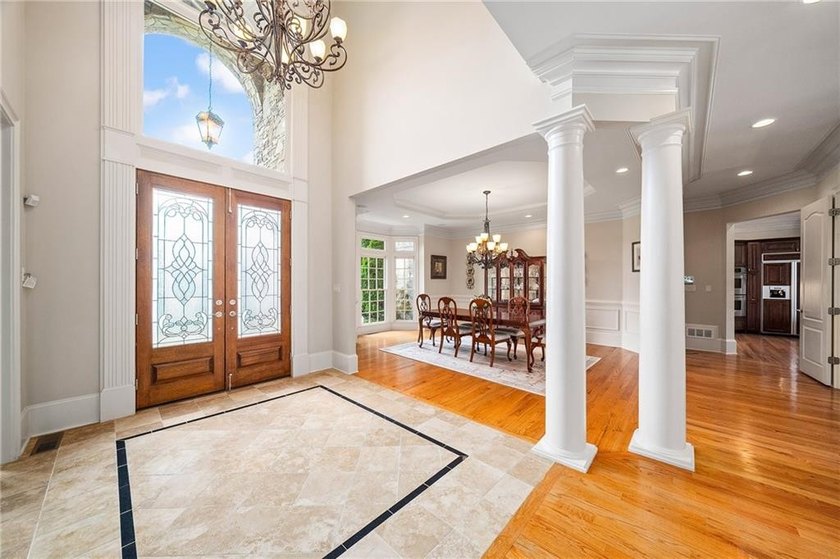 Situated on 1.2+/- private acres within Milton's gated Roxbury - photo 6