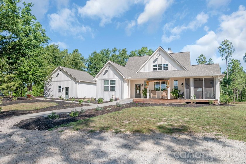 Wow, what a property! This one is truly a must see. Nestled on 5 - photo 2