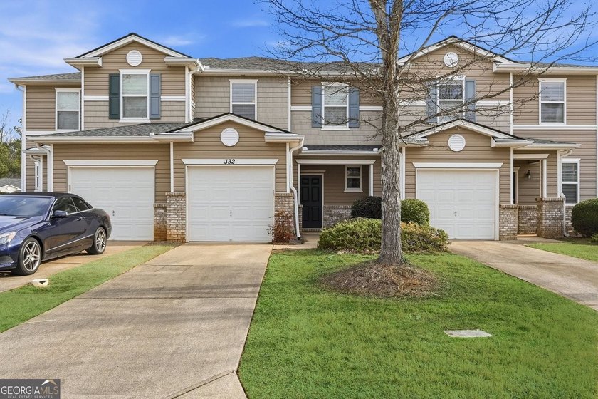 Built in 2005, this 1,551 sq. ft. 2-story townhome features 3 - photo 2