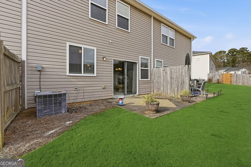 Built in 2005, this 1,551 sq. ft. 2-story townhome features 3 - photo 4