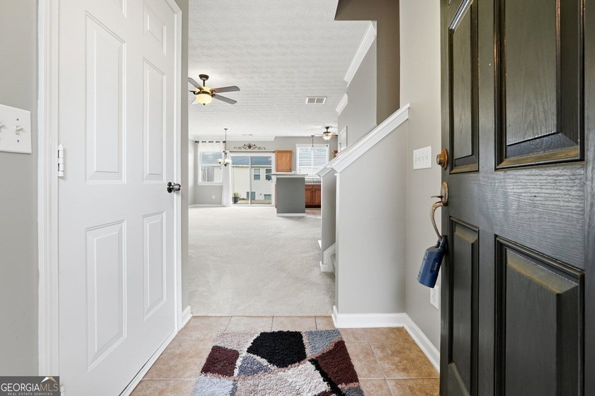 Built in 2005, this 1,551 sq. ft. 2-story townhome features 3 - photo 6
