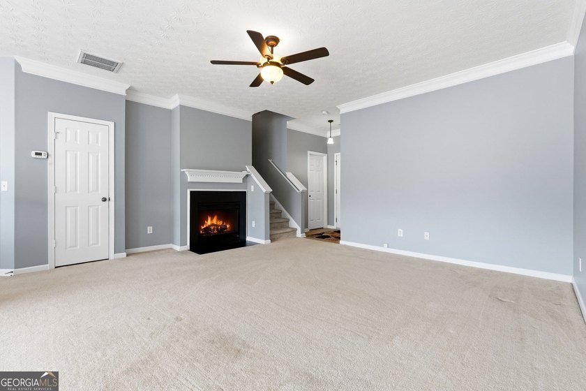 Built in 2005, this 1,551 sq. ft. 2-story townhome features 3 - photo 9