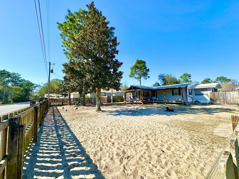 $5,000 to Buyer at closing! Set in a highly desirable - photo 2