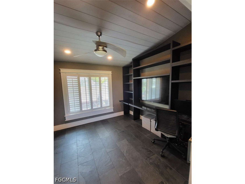 Experience refined Naples living in this beautifully updated - photo 14