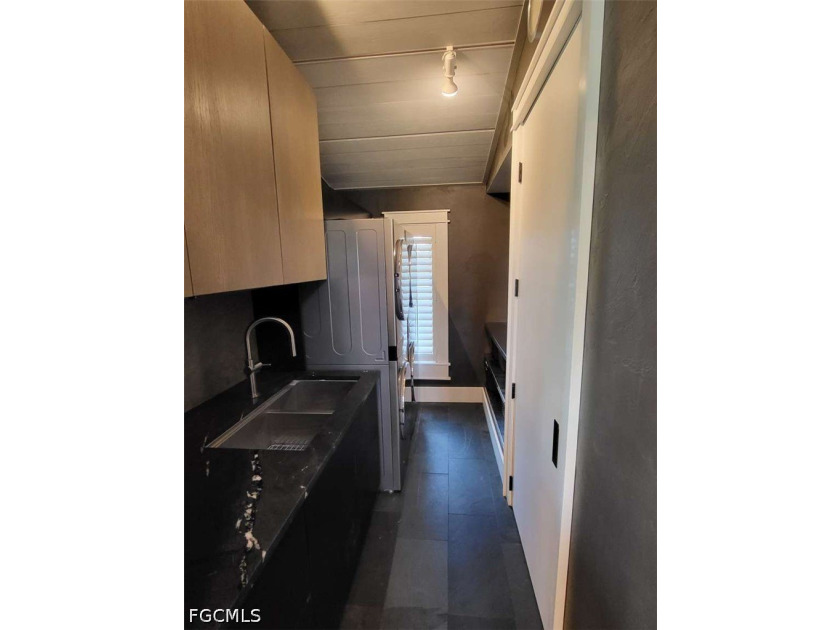 Experience refined Naples living in this beautifully updated - photo 16