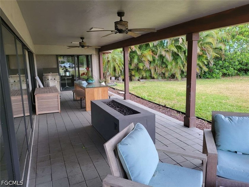 Experience refined Naples living in this beautifully updated - photo 19