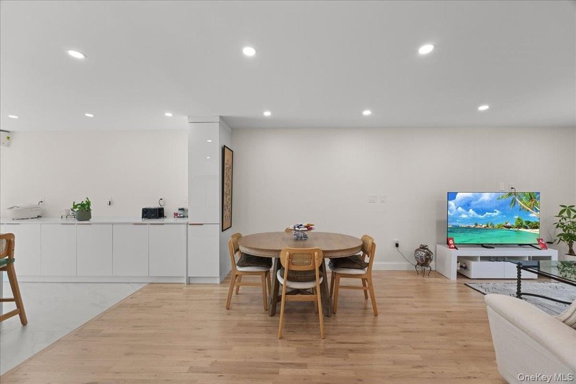 Welcome to this beautifully remodeled single-family home in the - photo 4
