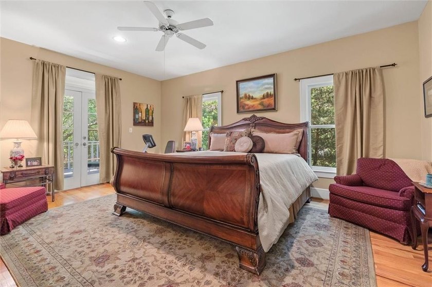 Stately southern elegance situated on a lush 2.6 acre wooded lot - photo 25