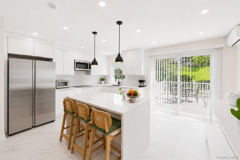 Welcome to this beautifully remodeled single-family home in the - photo 5