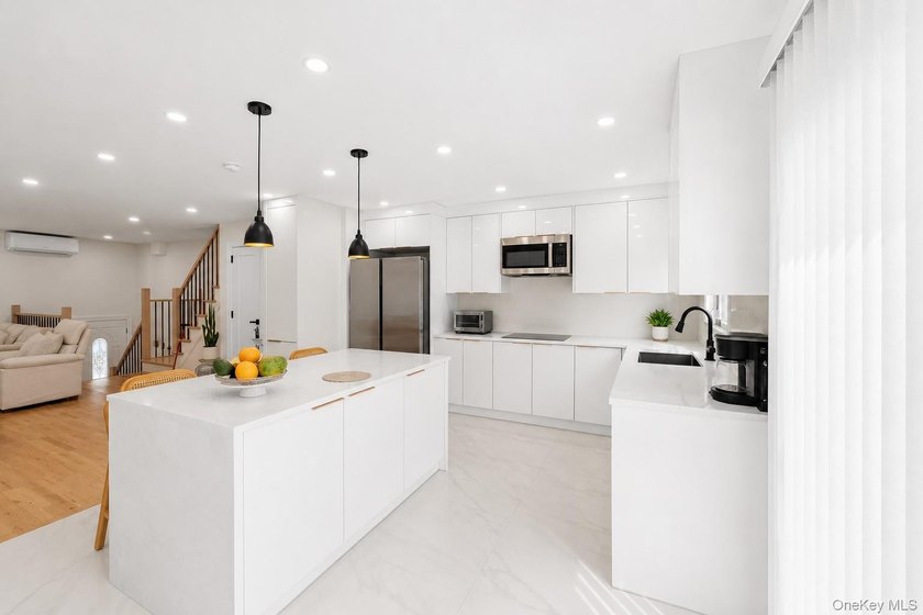 Welcome to this beautifully remodeled single-family home in the - photo 6