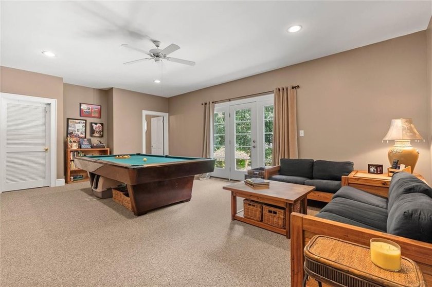 Stately southern elegance situated on a lush 2.6 acre wooded lot - photo 27