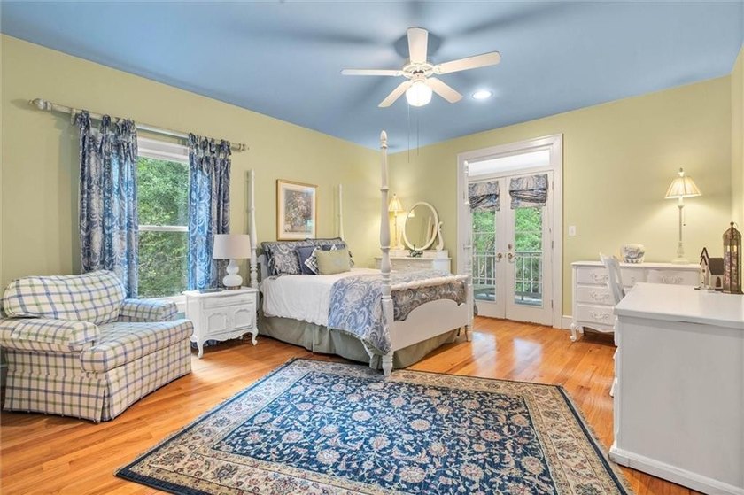 Stately southern elegance situated on a lush 2.6 acre wooded lot - photo 29