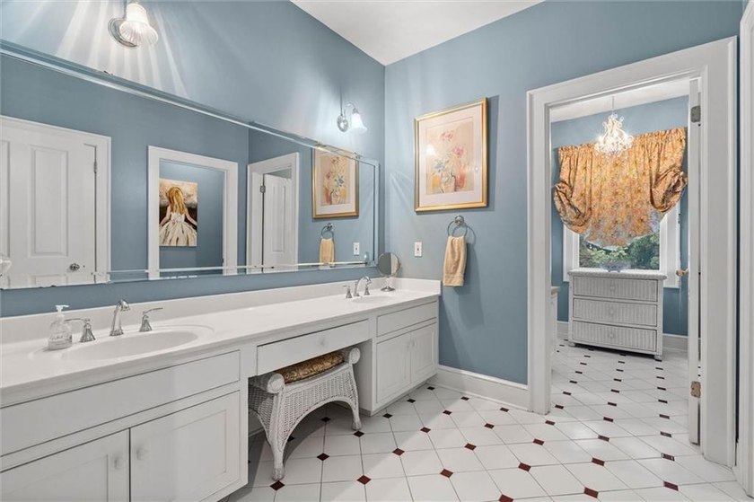 Stately southern elegance situated on a lush 2.6 acre wooded lot - photo 30
