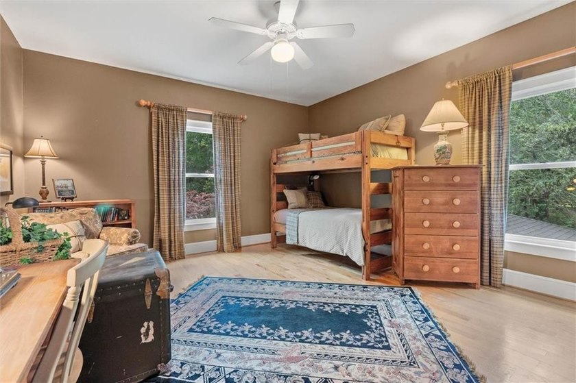 Stately southern elegance situated on a lush 2.6 acre wooded lot - photo 31