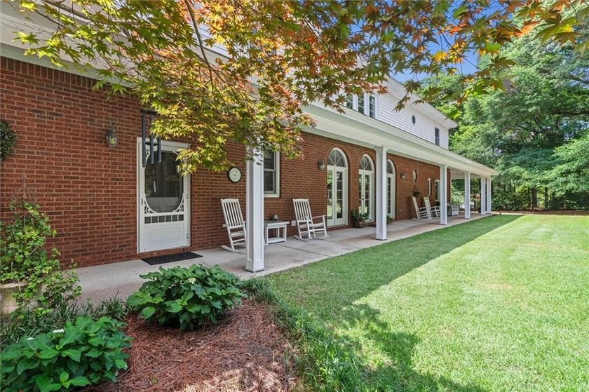 Stately southern elegance situated on a lush 2.6 acre wooded lot - photo 33