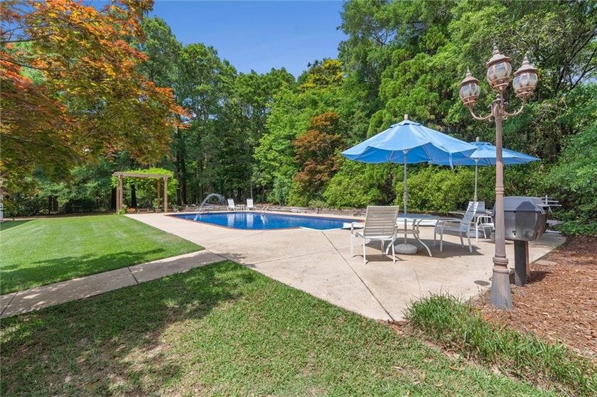 Stately southern elegance situated on a lush 2.6 acre wooded lot - photo 34