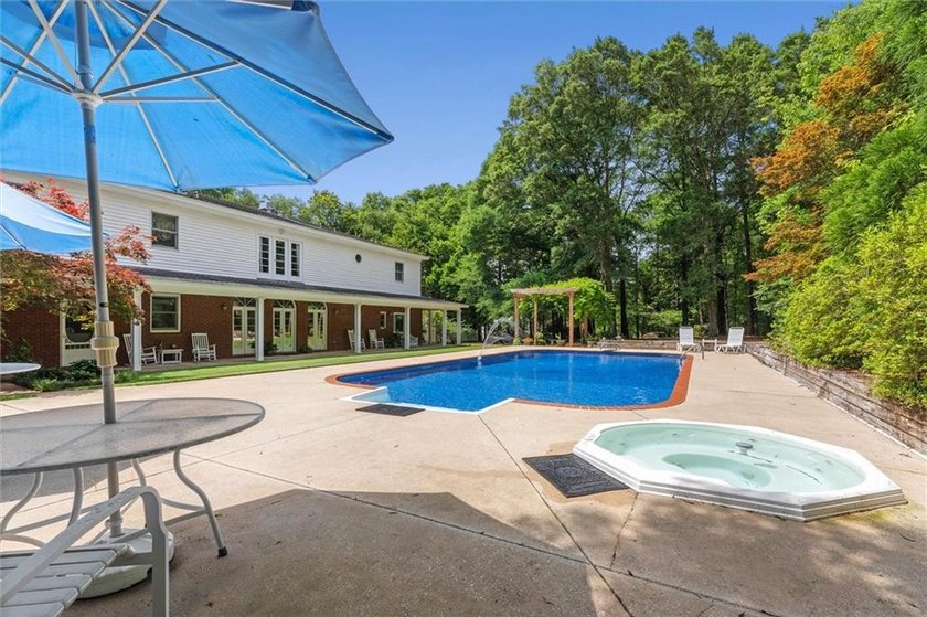 Stately southern elegance situated on a lush 2.6 acre wooded lot - photo 35