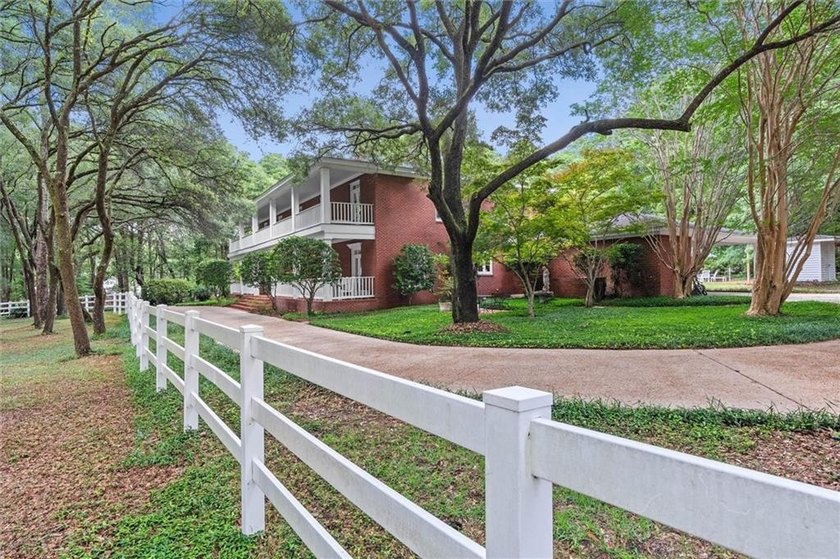 Stately southern elegance situated on a lush 2.6 acre wooded lot - photo 43