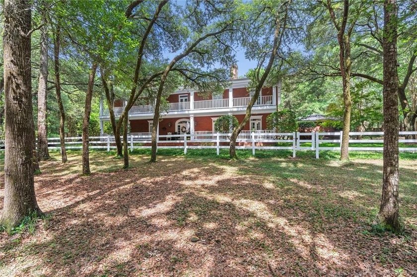 Stately southern elegance situated on a lush 2.6 acre wooded lot - photo 44