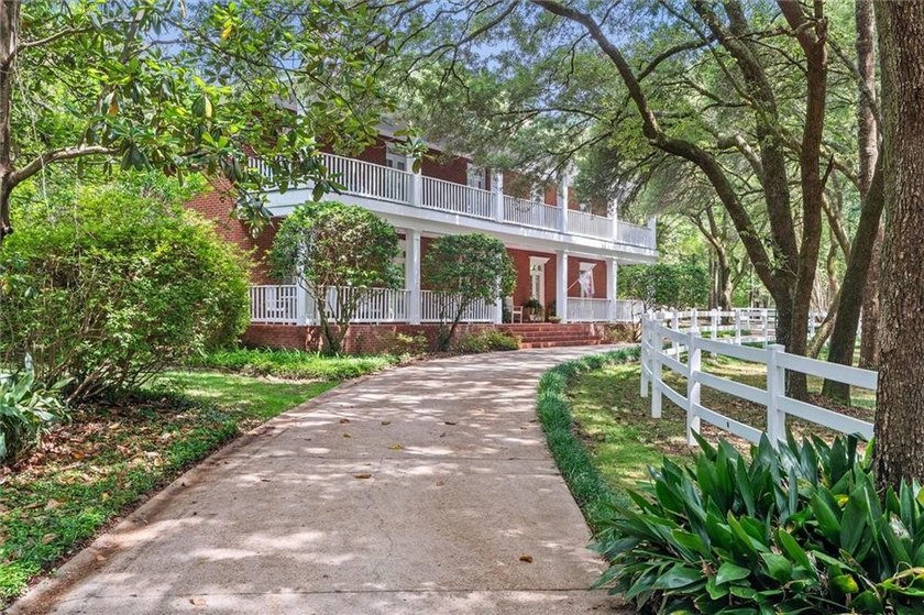 Stately southern elegance situated on a lush 2.6 acre wooded lot - photo 46