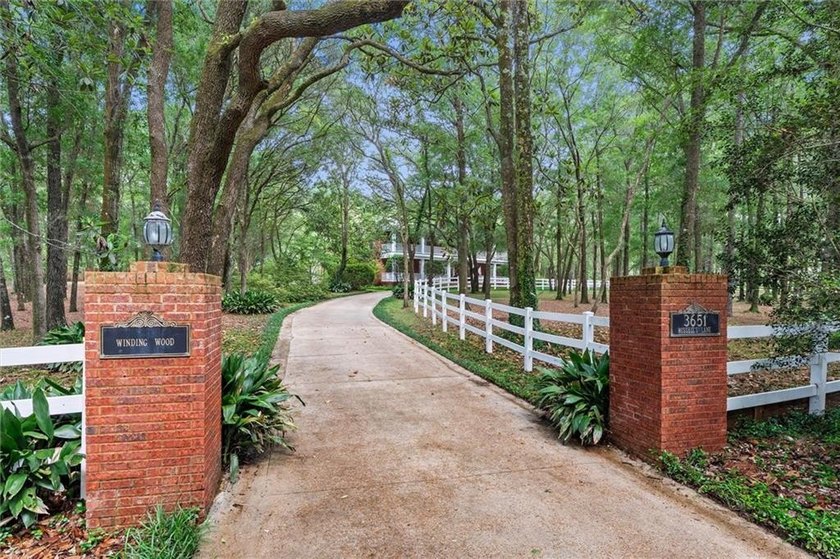 Stately southern elegance situated on a lush 2.6 acre wooded lot - photo 47