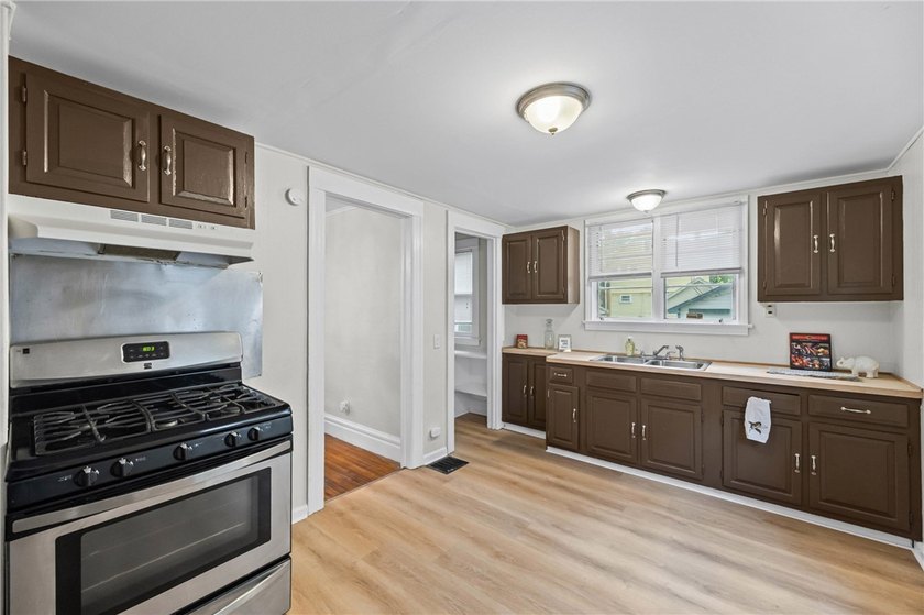 OPPORTUNITY! Welcome to this charming home conveniently located - photo 9