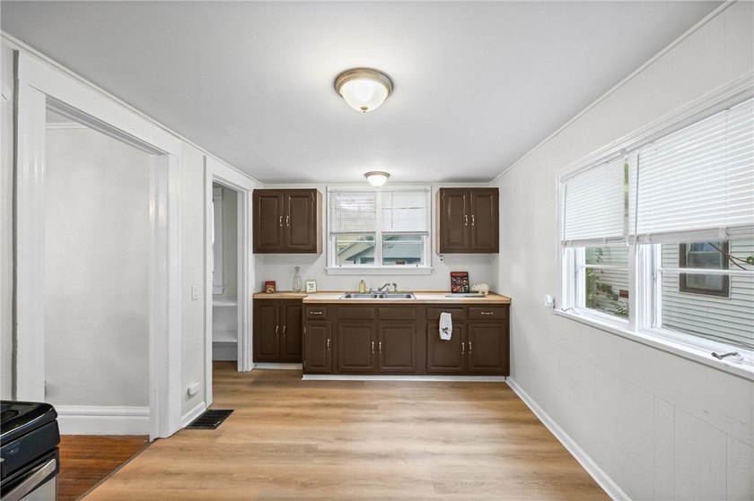 OPPORTUNITY! Welcome to this charming home conveniently located - photo 10