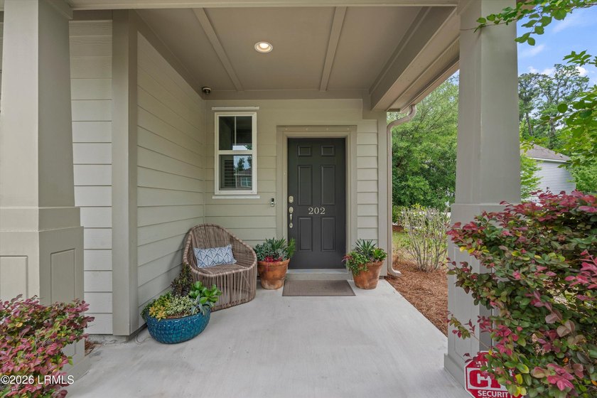 Located in the gated community of Shell Hall, this fully - photo 3