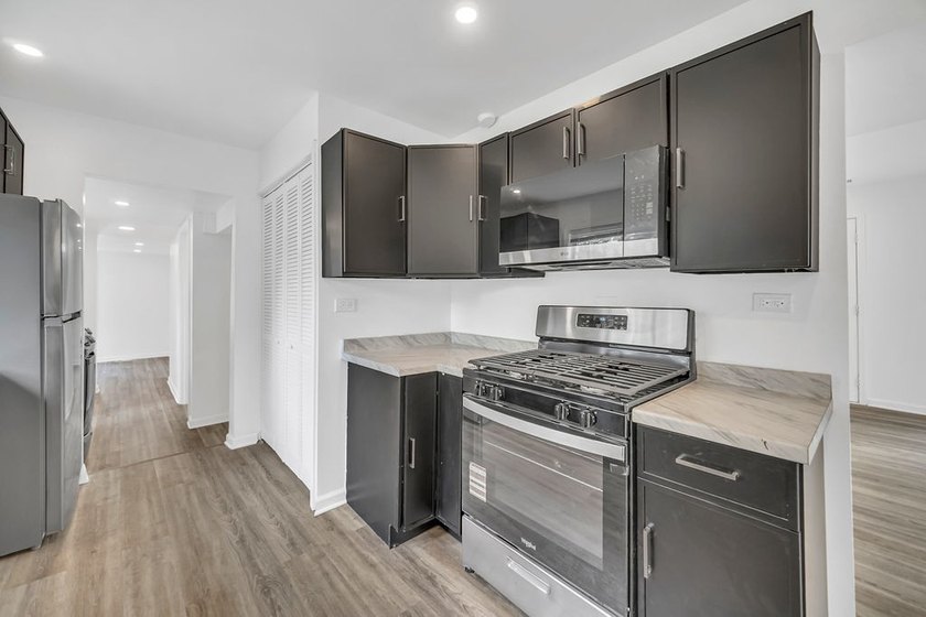 Completely remodeled and move-in ready, this beautifully updated - photo 6