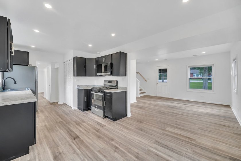 Completely remodeled and move-in ready, this beautifully updated - photo 10