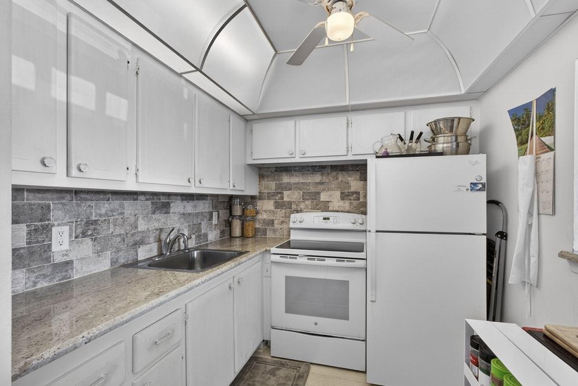 Welcome to this beautifully maintained 1-bedroom, 1.5-bath - photo 15