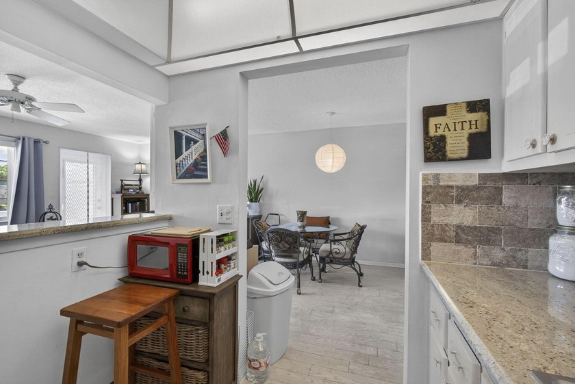 Welcome to this beautifully maintained 1-bedroom, 1.5-bath - photo 17